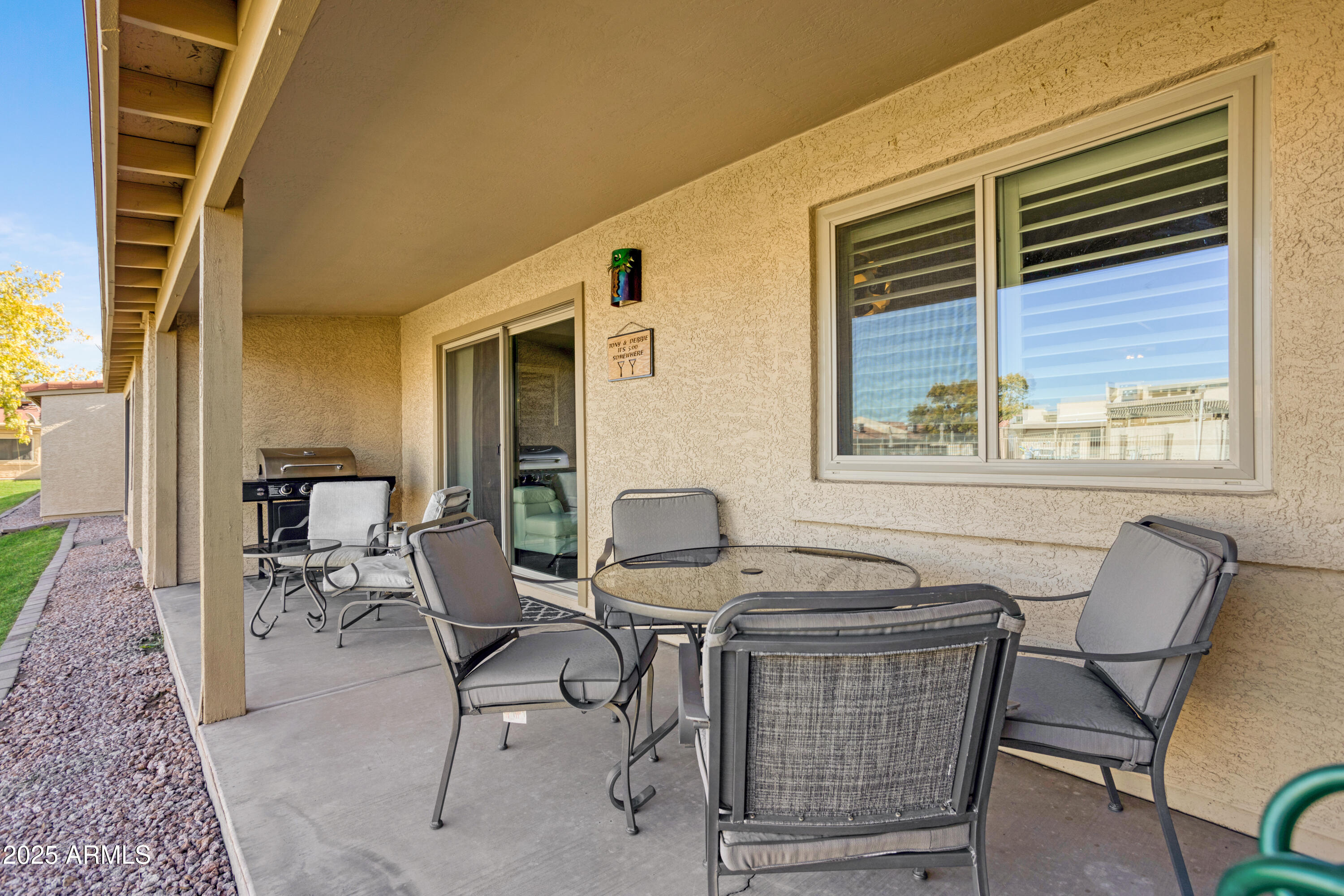 1021 South Greenfield Road, Unit 1195 Mesa, AZ 85206 - Photo 30 of 41 a dining room with furniture and window