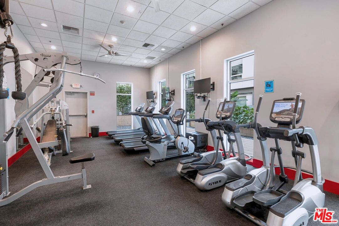 645 West 9th Street, Unit 740 Los Angeles, CA 90015 - Photo 43 of 63 a view of a room with gym equipment