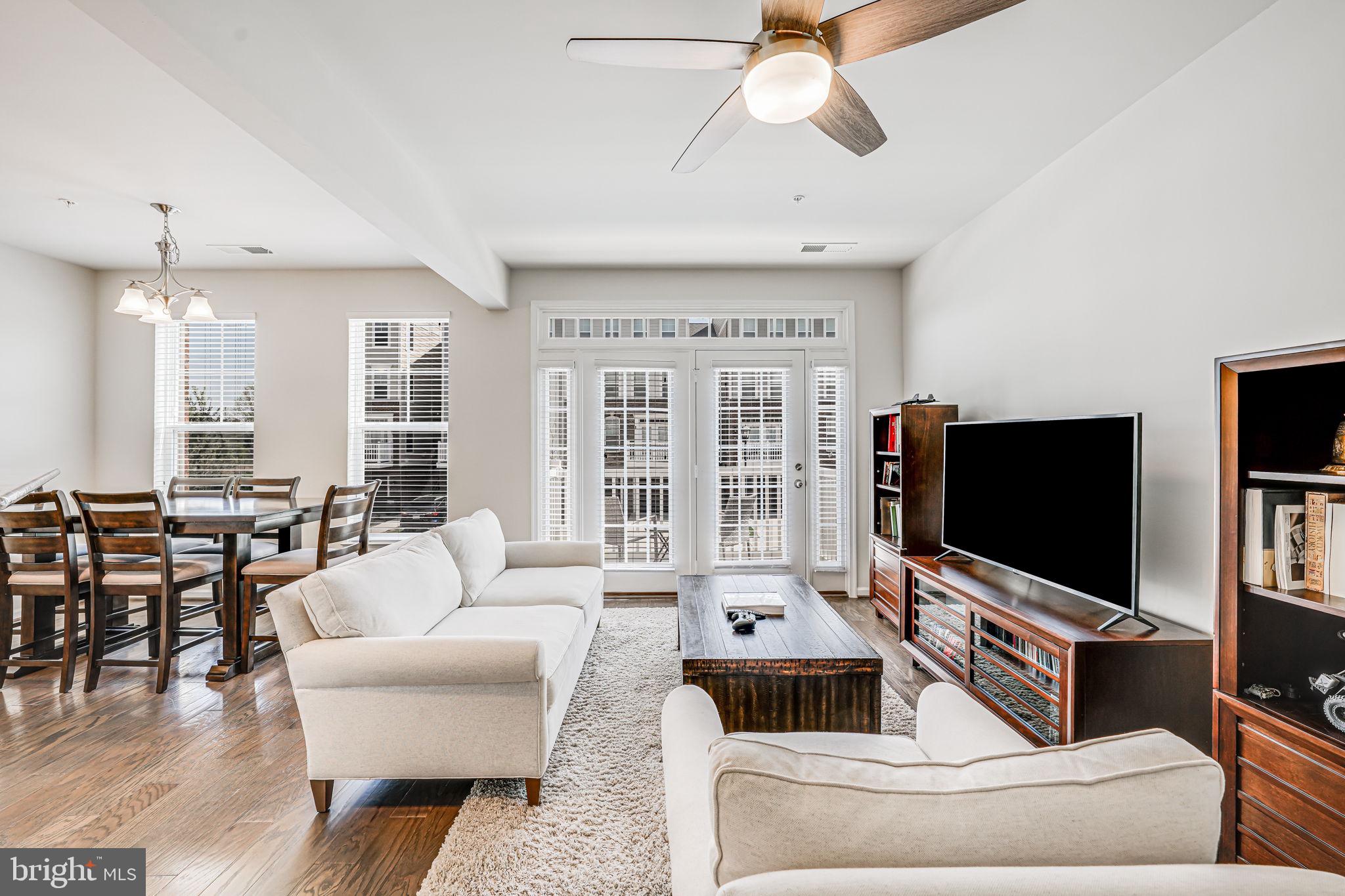 43373 Town Gate Square Chantilly, VA 20152 - Photo 15 of 30 a living room with furniture and a flat screen tv