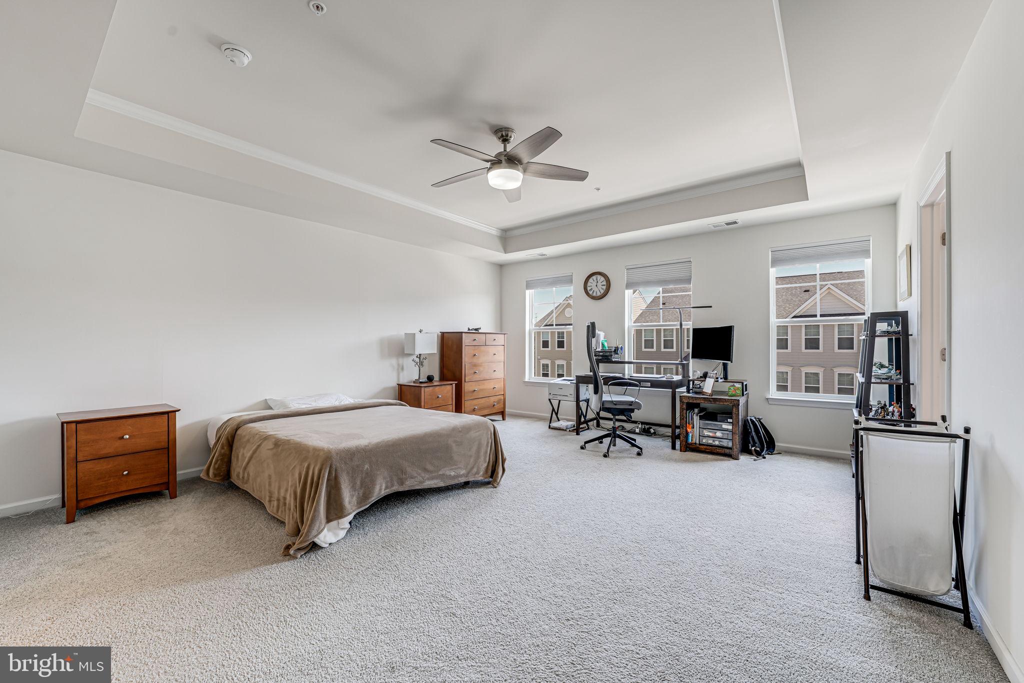 43373 Town Gate Square Chantilly, VA 20152 - Photo 24 of 30 a living room with furniture and a chandelier