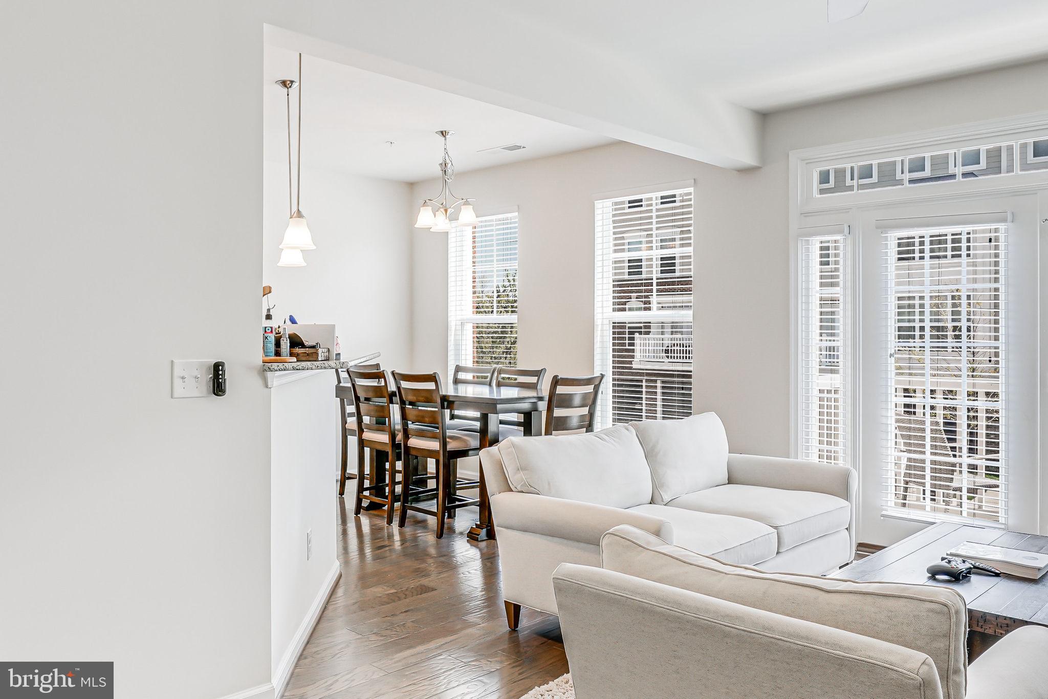 43373 Town Gate Square Chantilly, VA 20152 - Photo 5 of 30 a living room with furniture and a large window