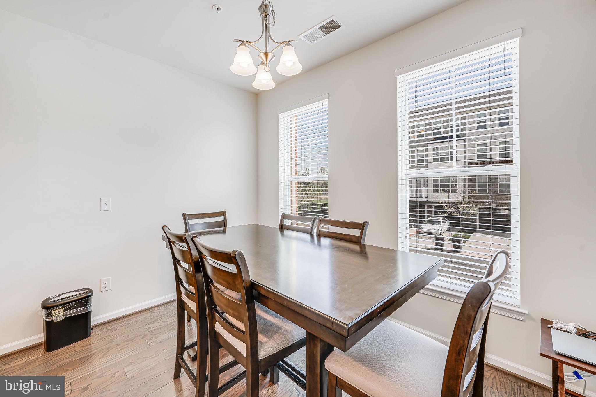 43373 Town Gate Square Chantilly, VA 20152 - Photo 9 of 30 a view of a dining room with furniture window and outside view