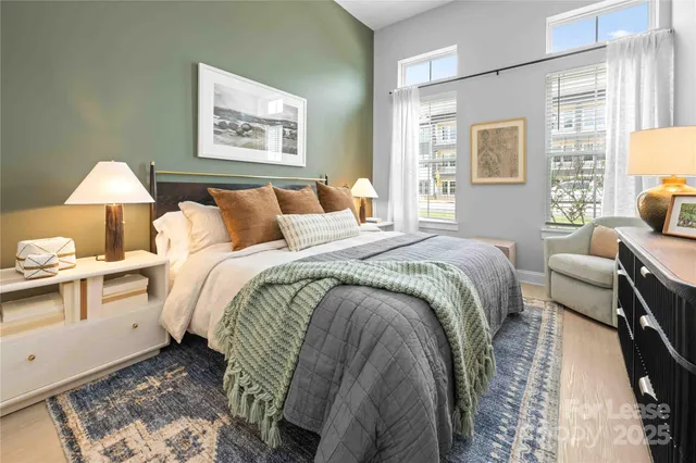 a bedroom with bed and window