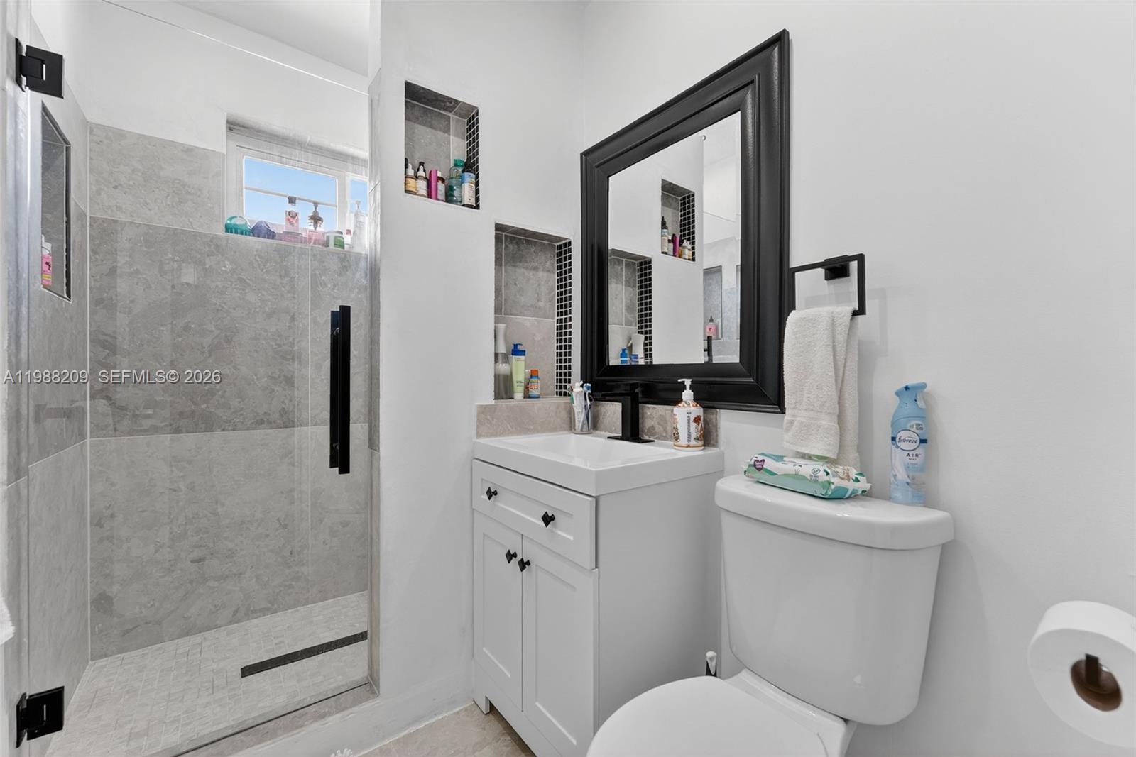 26672 Southwest 137th Court Homestead, FL 33032 - Photo 20 of 34 a bathroom with a sink toilet and shower