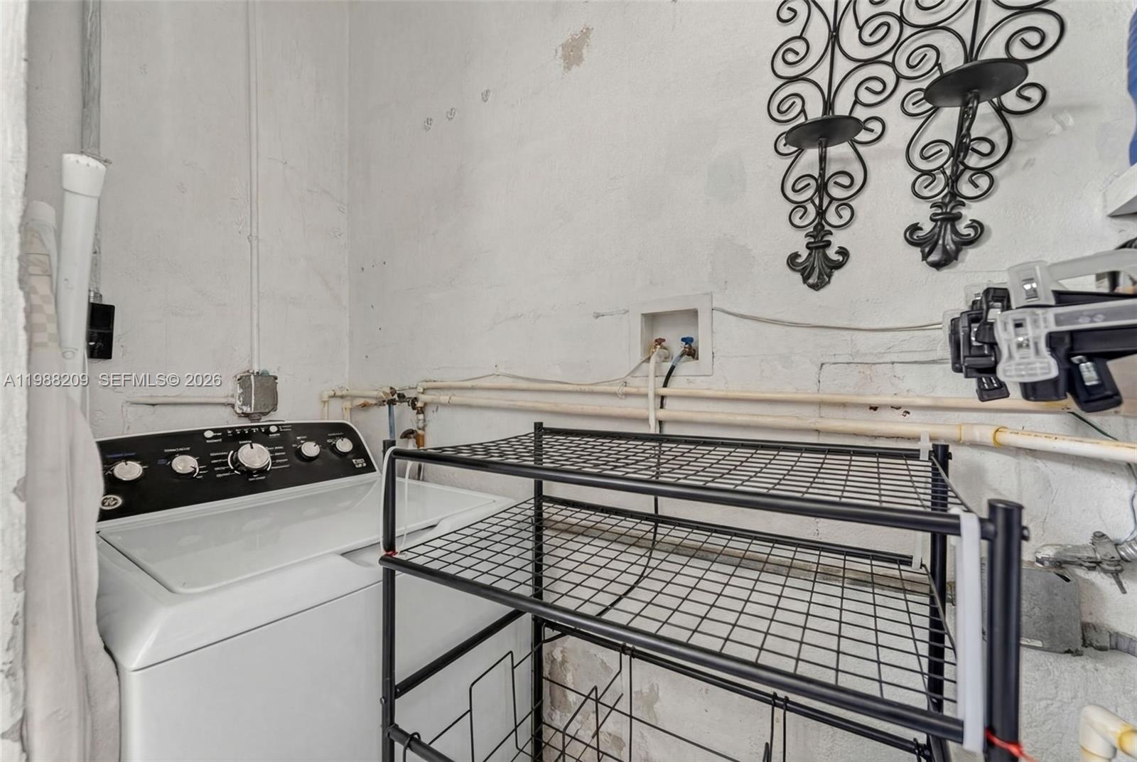 26672 Southwest 137th Court Homestead, FL 33032 - Photo 21 of 34 a view of washer and dryer