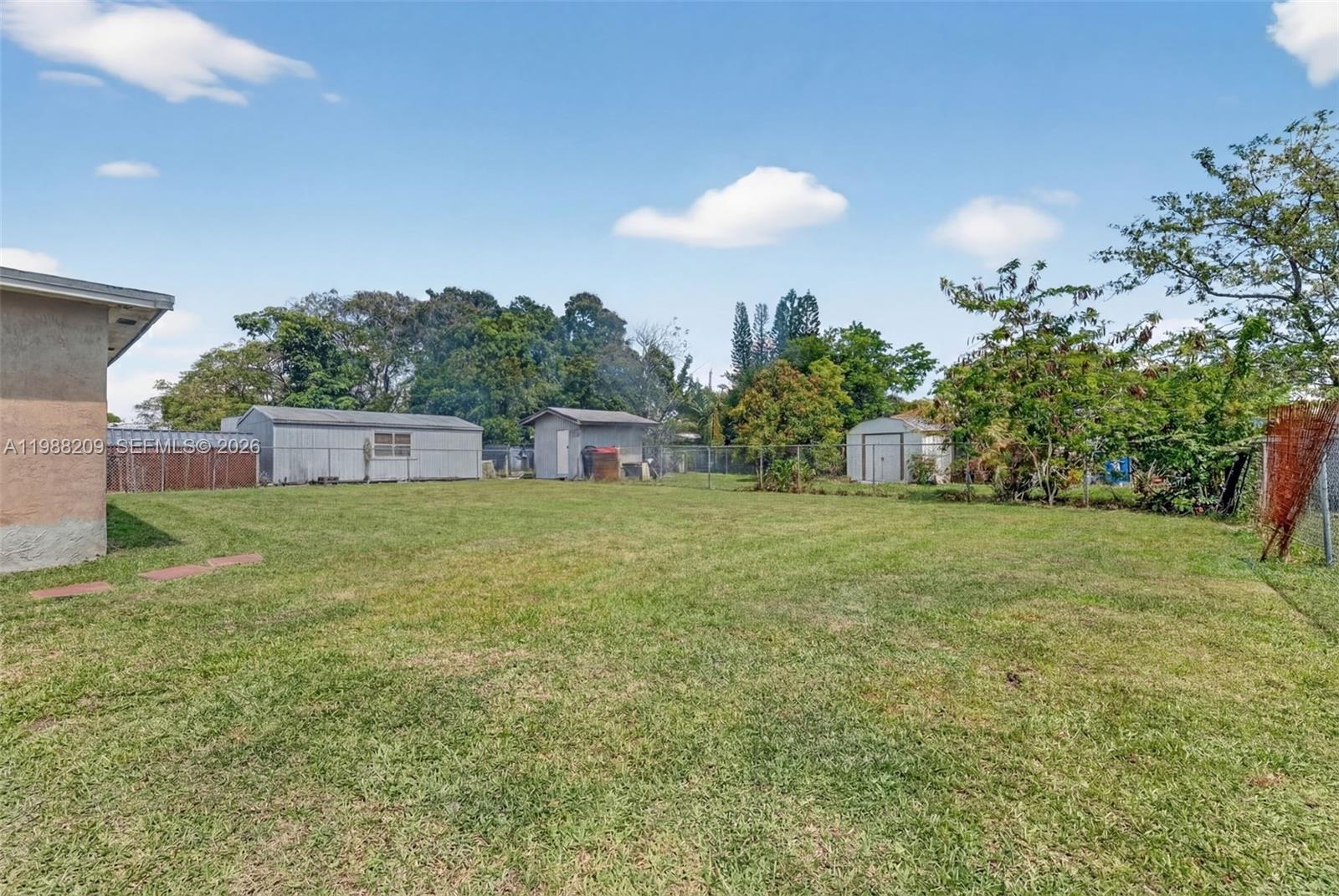 26672 Southwest 137th Court Homestead, FL 33032 - Photo 23 of 34 a view of a house with a backyard