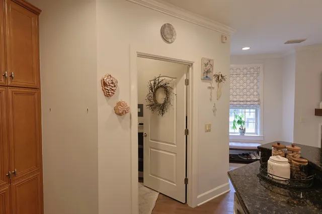 a bathroom with a granite countertop shower mirror and a sink