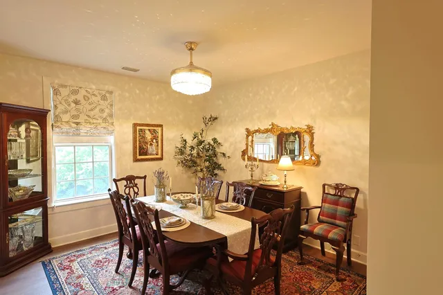 a view of a dining room with furniture