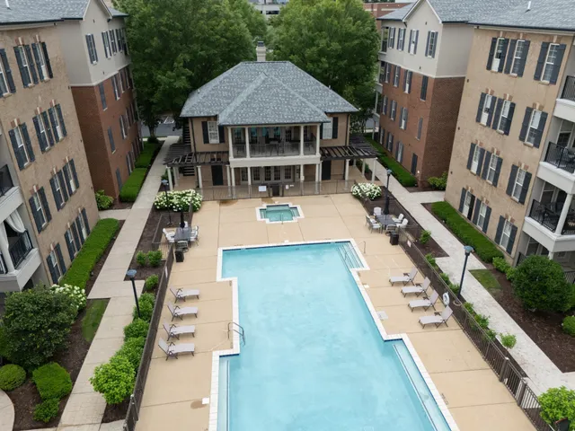a view of multiple houses with a street