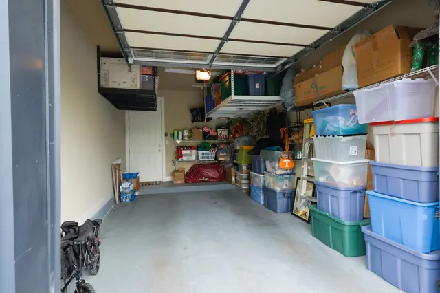 an aerial view of a house with a swimming pool