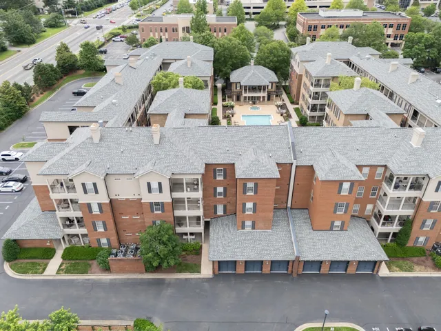 aerial view of multi story residential apartment building