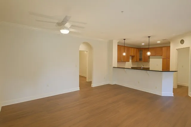 a view of a kitchen with a dishwasher and a refrigerator