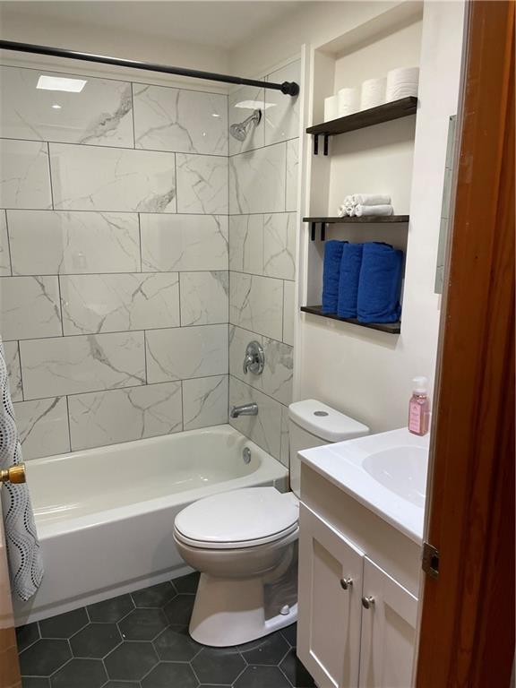 4218 Warren Road Indiana, PA 15701 - Photo 11 of 23 a bathroom with a sink a toilet and a bathtub