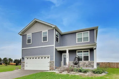 a view of front of a house with a yard