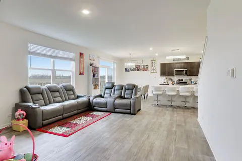 a living room with furniture and a couch