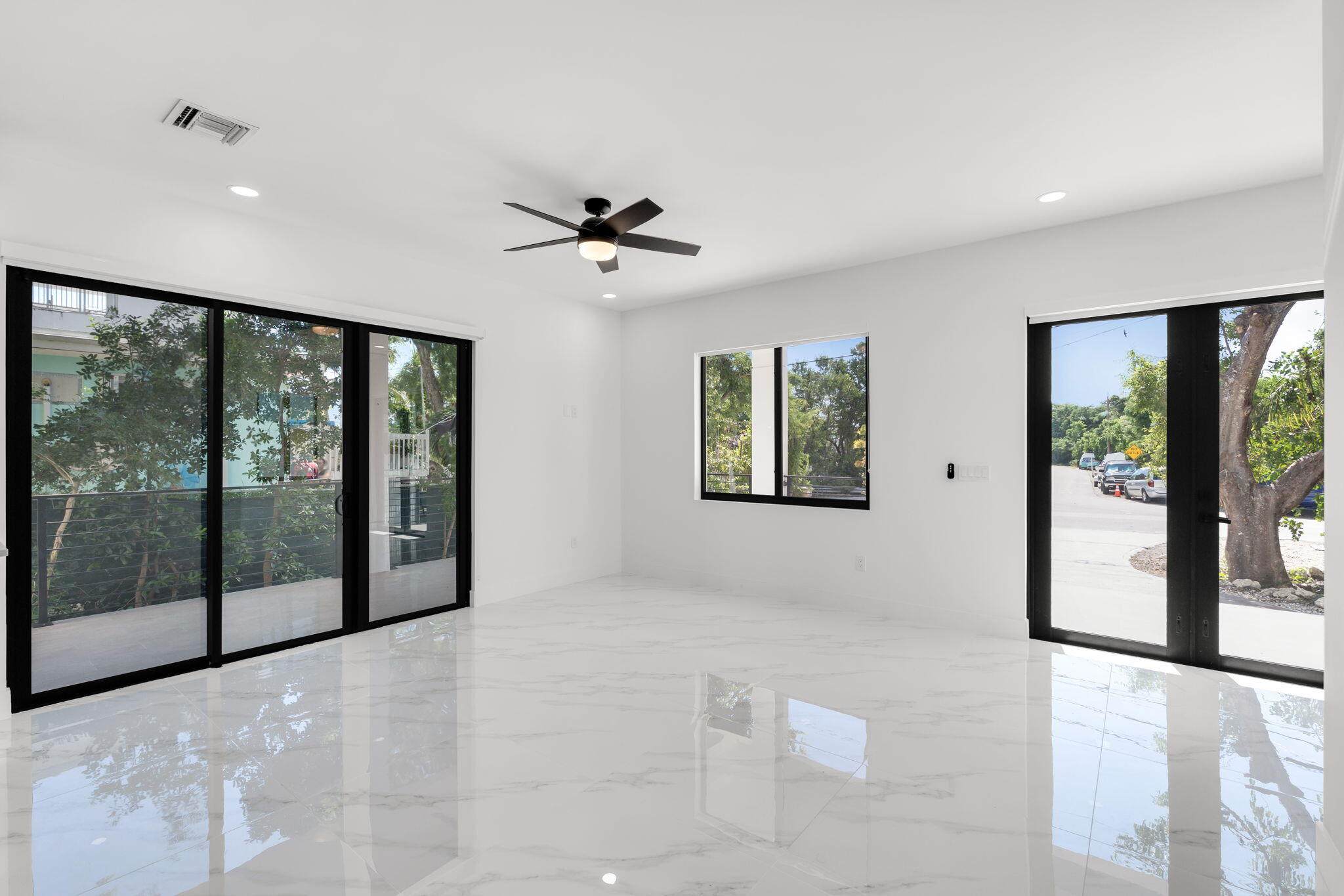 50 Transylvania Avenue Key Largo, FL 33037 - Photo 16 of 59 a view of an empty room with windows