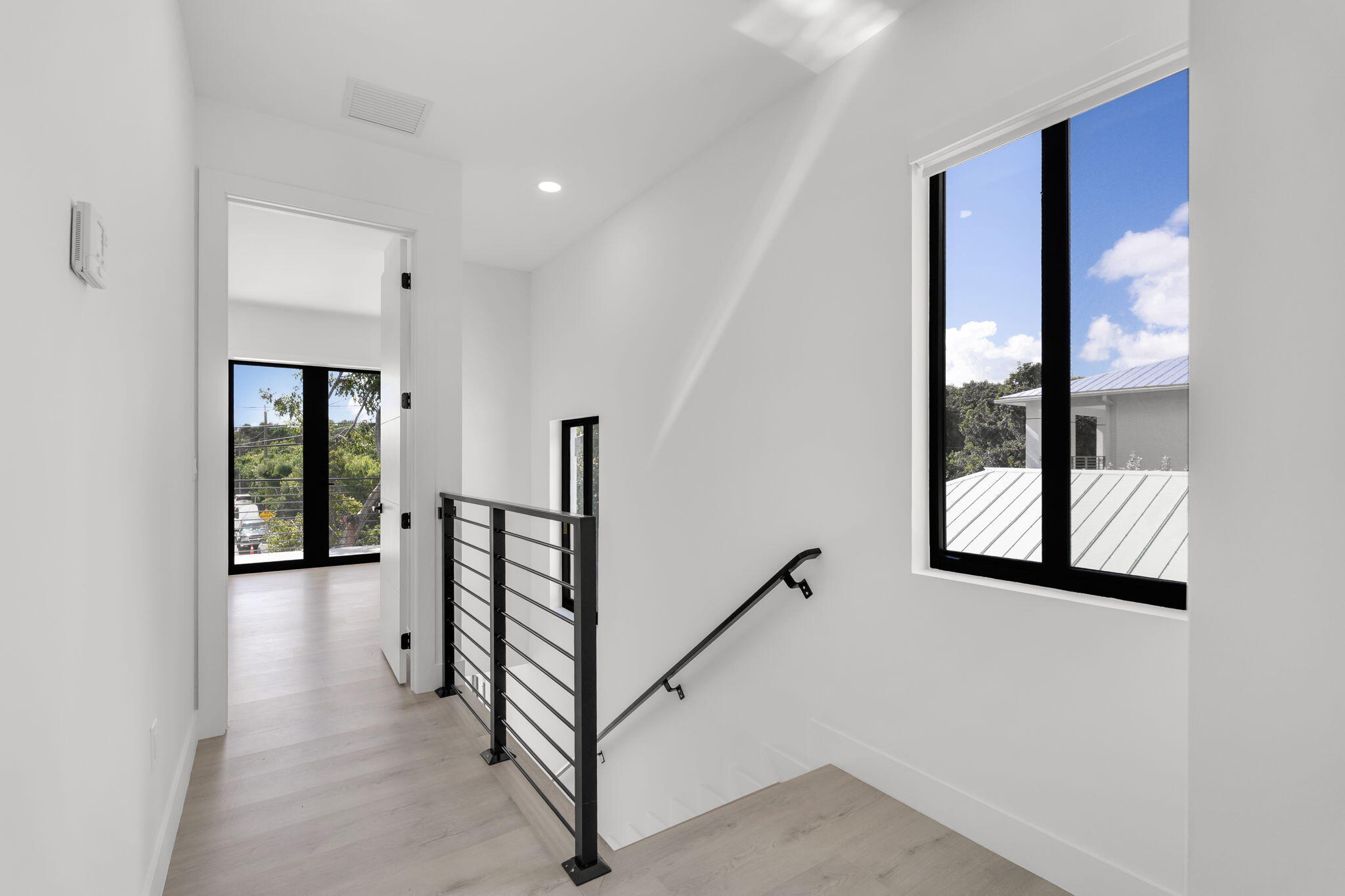50 Transylvania Avenue Key Largo, FL 33037 - Photo 18 of 59 a view of a hallway with staircase