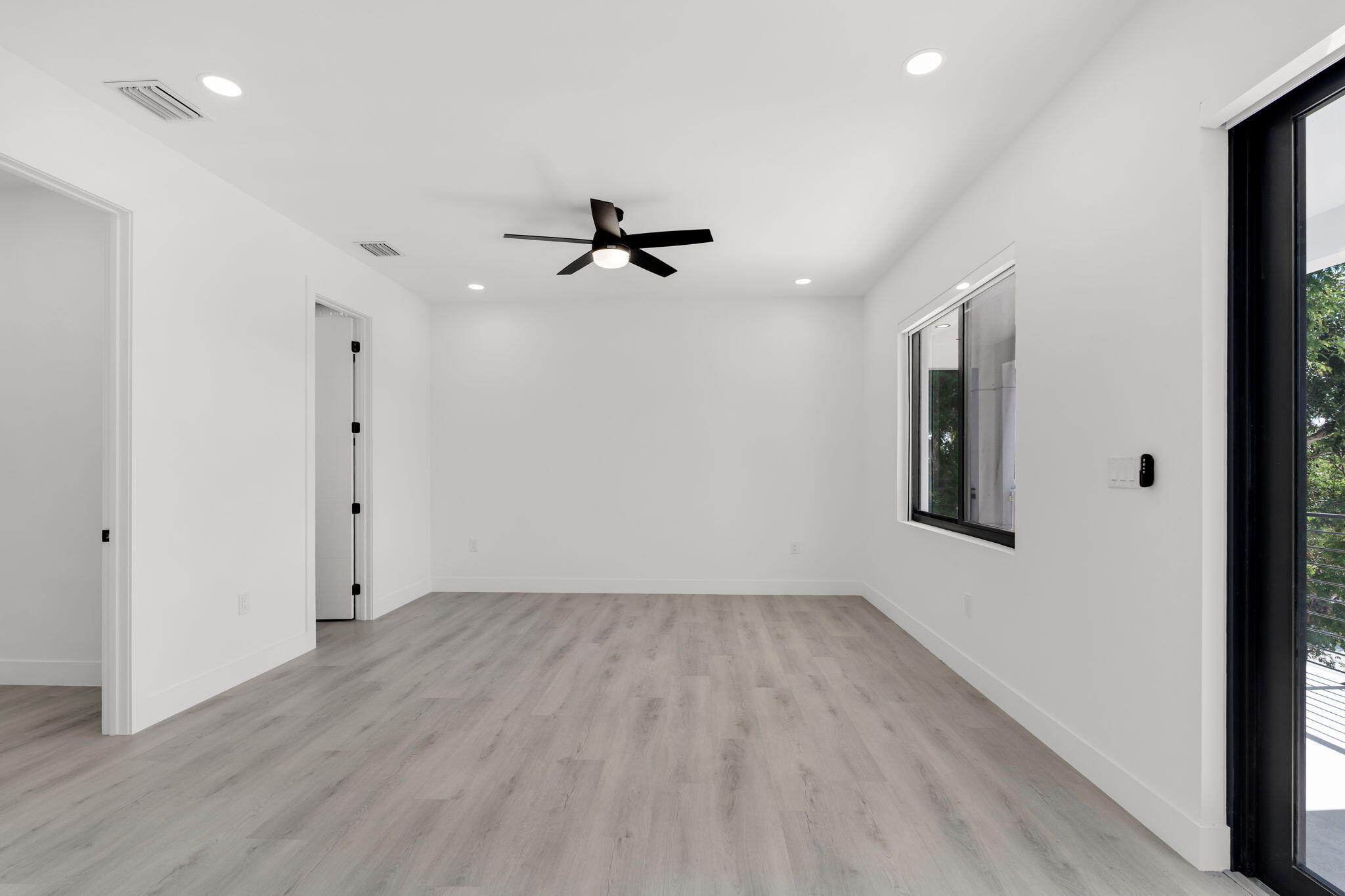 50 Transylvania Avenue Key Largo, FL 33037 - Photo 25 of 59 a view of empty room with wooden floor and fan