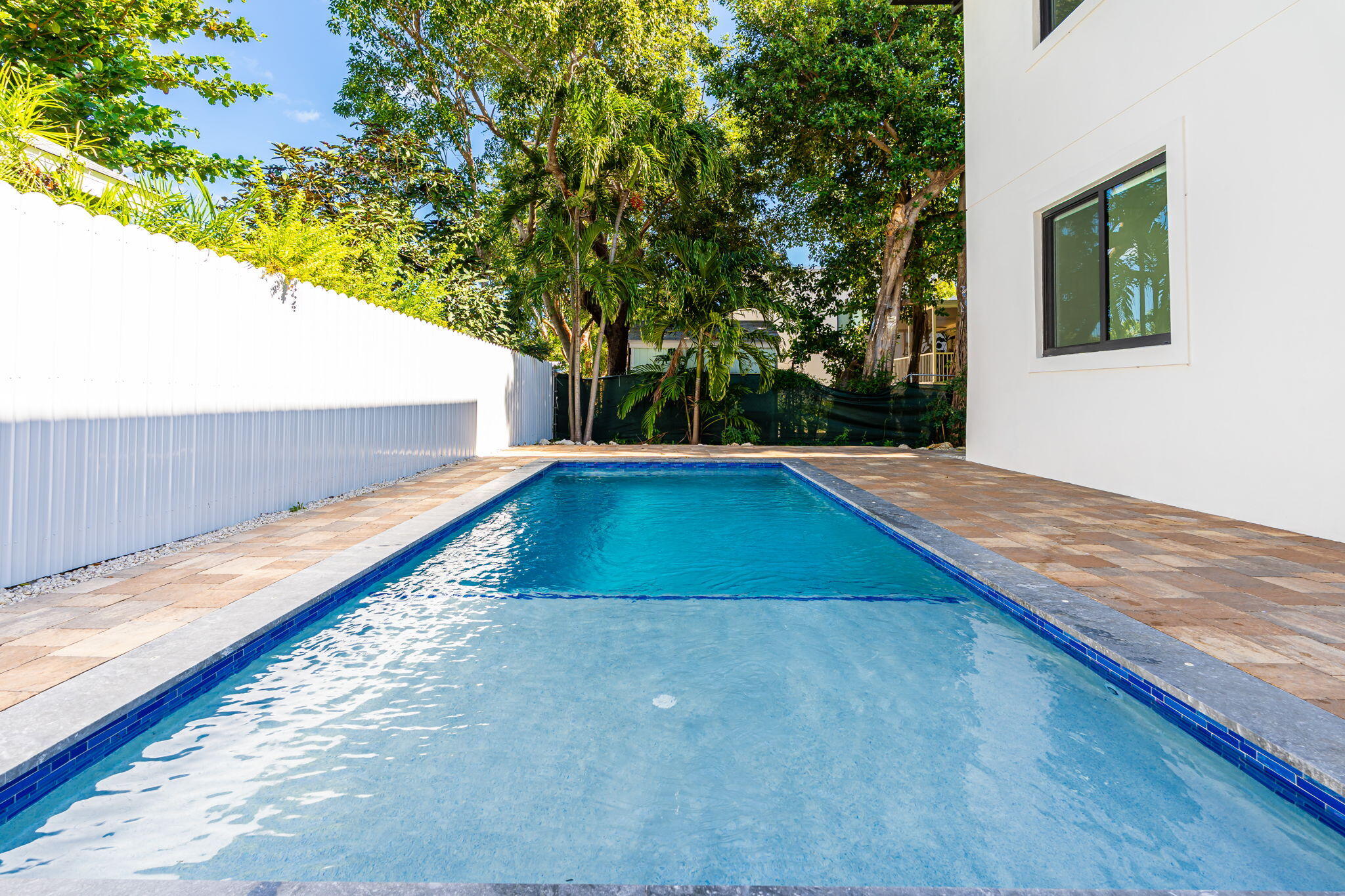50 Transylvania Avenue Key Largo, FL 33037 - Photo 3 of 59 a view of a backyard of a house