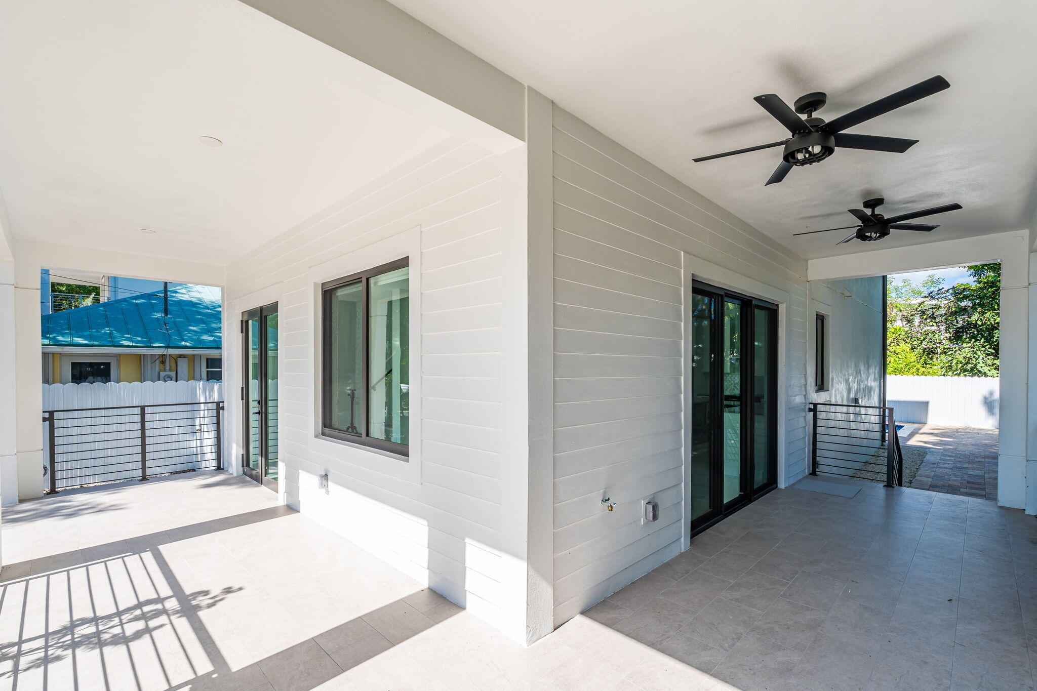 50 Transylvania Avenue Key Largo, FL 33037 - Photo 37 of 59 a bedroom with a bed and a large window