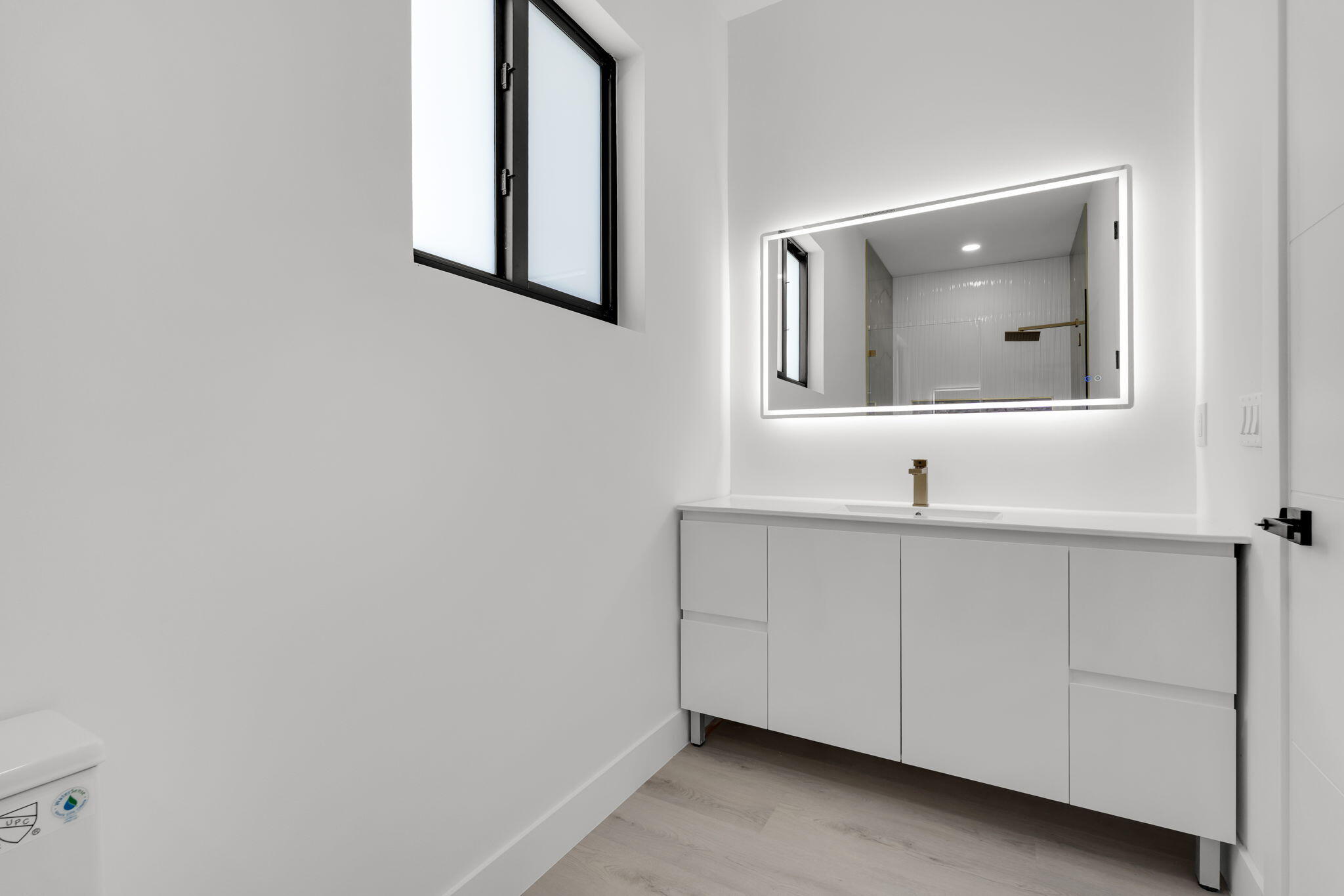 50 Transylvania Avenue Key Largo, FL 33037 - Photo 45 of 59 a bathroom with a sink and a mirror