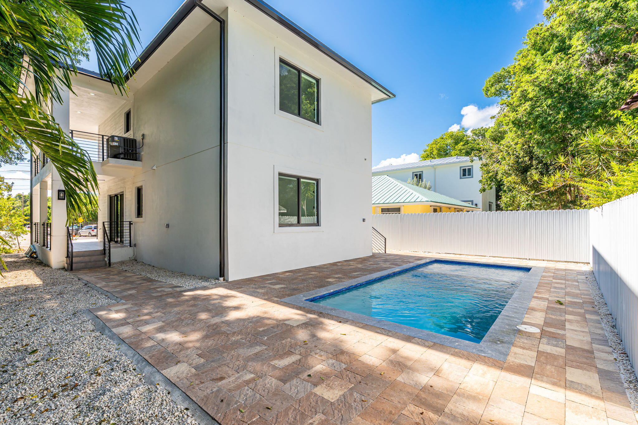 50 Transylvania Avenue Key Largo, FL 33037 - Photo 48 of 59 a view of a house with a yard