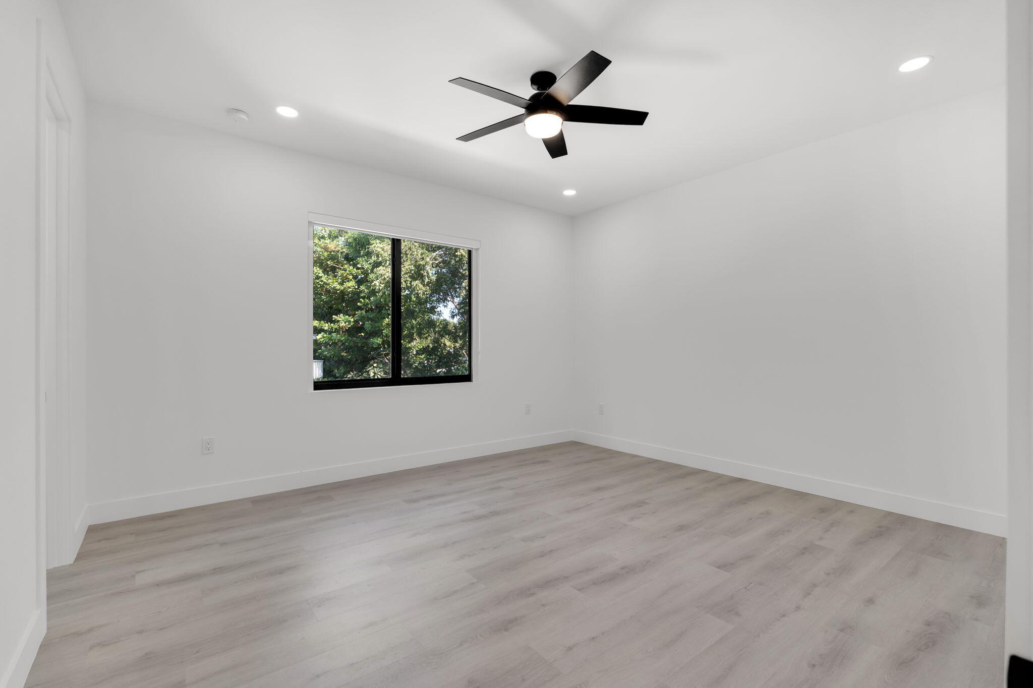 50 Transylvania Avenue Key Largo, FL 33037 - Photo 51 of 59 an empty room with window and ceiling fan
