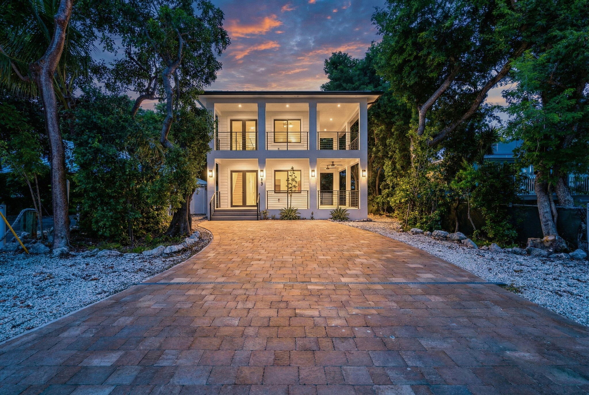 50 Transylvania Avenue Key Largo, FL 33037 - Photo 6 of 59 a front view of a house with a yard