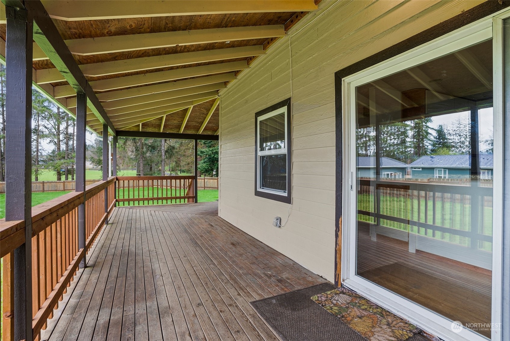 17 Maple Leaf Street Raymond, WA 98577 - Photo 21 of 27 a view of a porch with wooden floor and outdoor space