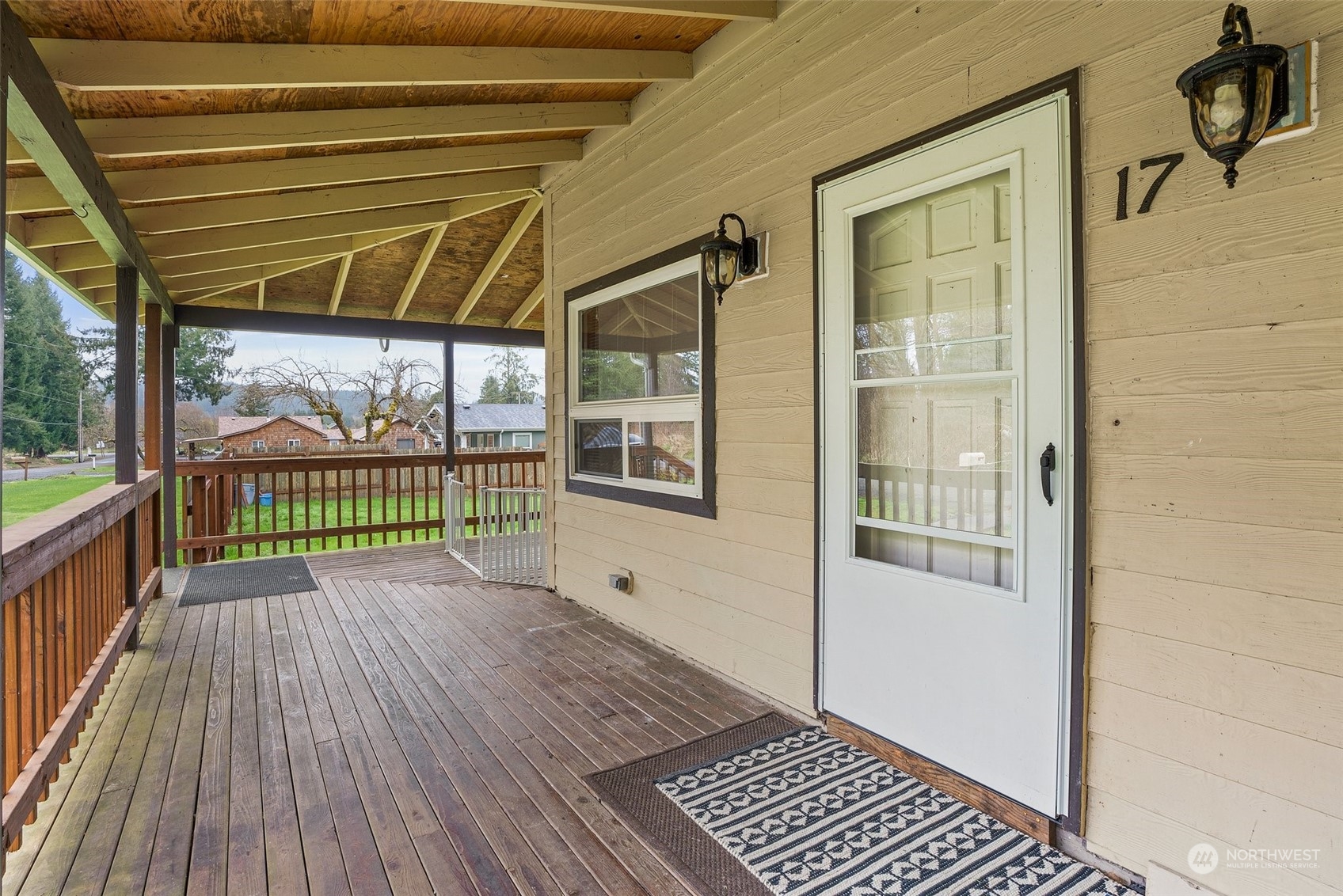 17 Maple Leaf Street Raymond, WA 98577 - Photo 4 of 27 a view of a porch with wooden floor