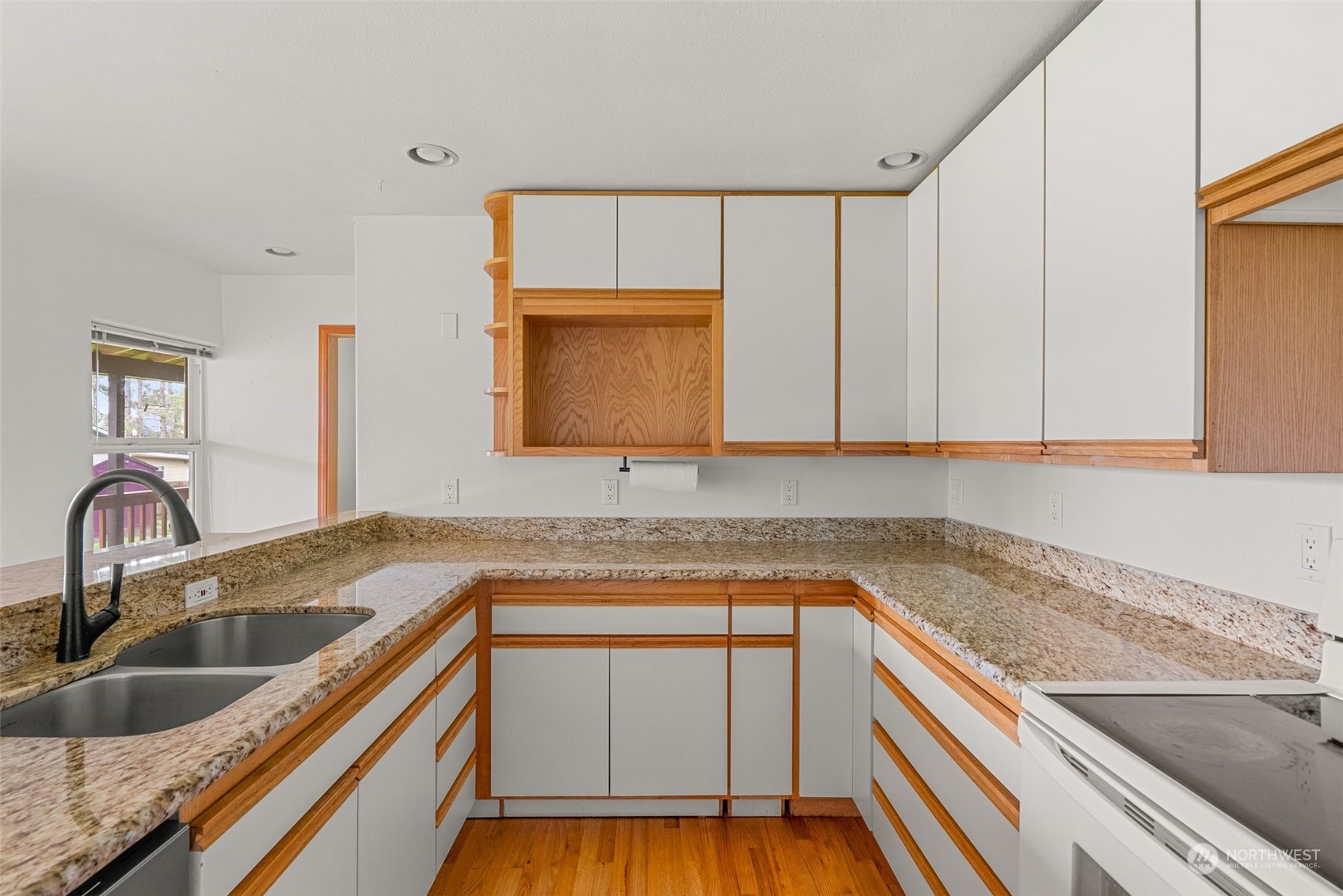 17 Maple Leaf Street Raymond, WA 98577 - Photo 9 of 27 a kitchen with a sink and a stove top oven