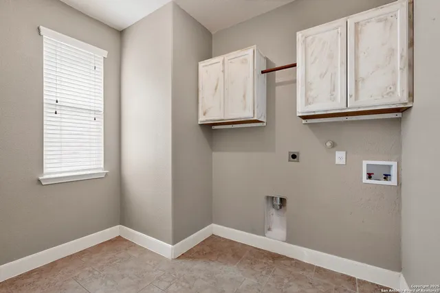 a view of an empty room with window