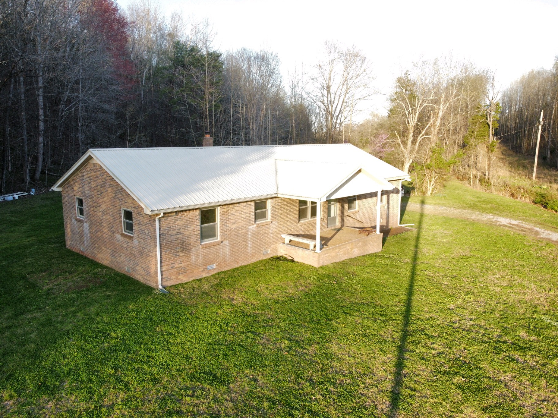 876 Denmark Road Erin, TN 37061 - Photo 1 of 45 a aerial view of a house with a yard