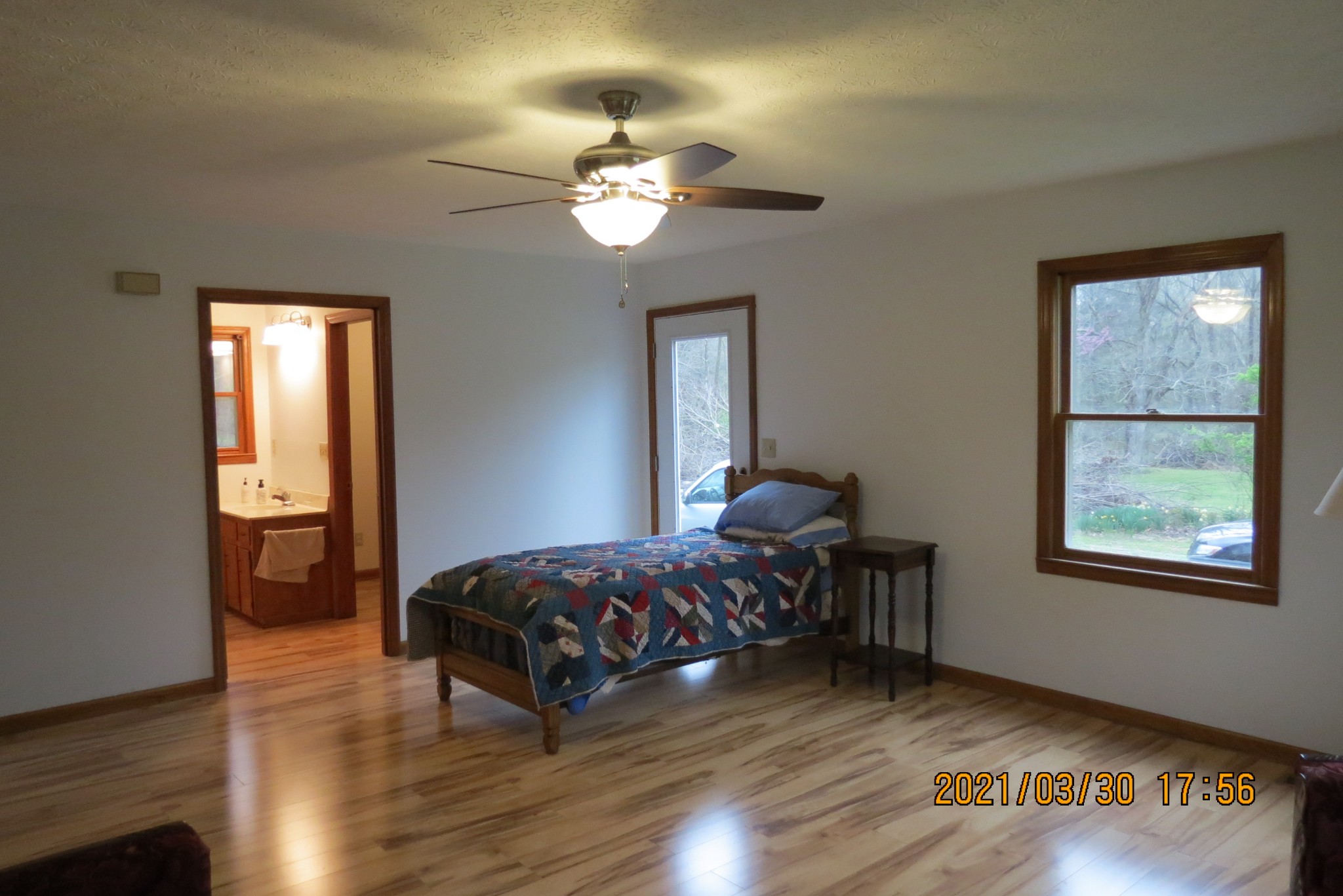 876 Denmark Road Erin, TN 37061 - Photo 11 of 45 a bedroom with bed and window