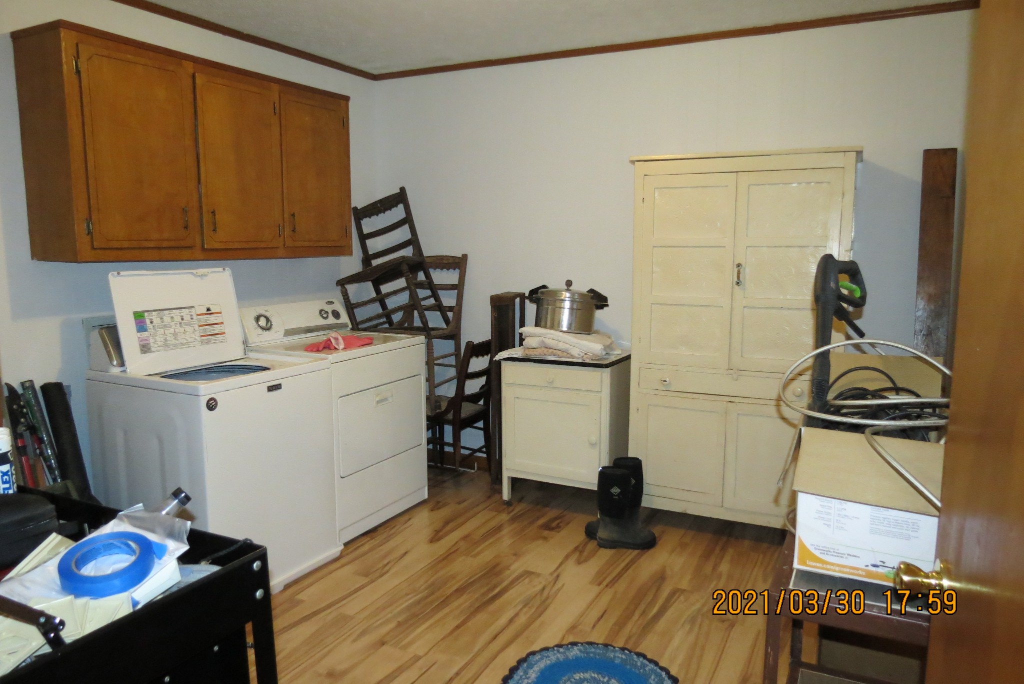 876 Denmark Road Erin, TN 37061 - Photo 19 of 45 a room with storage and utility