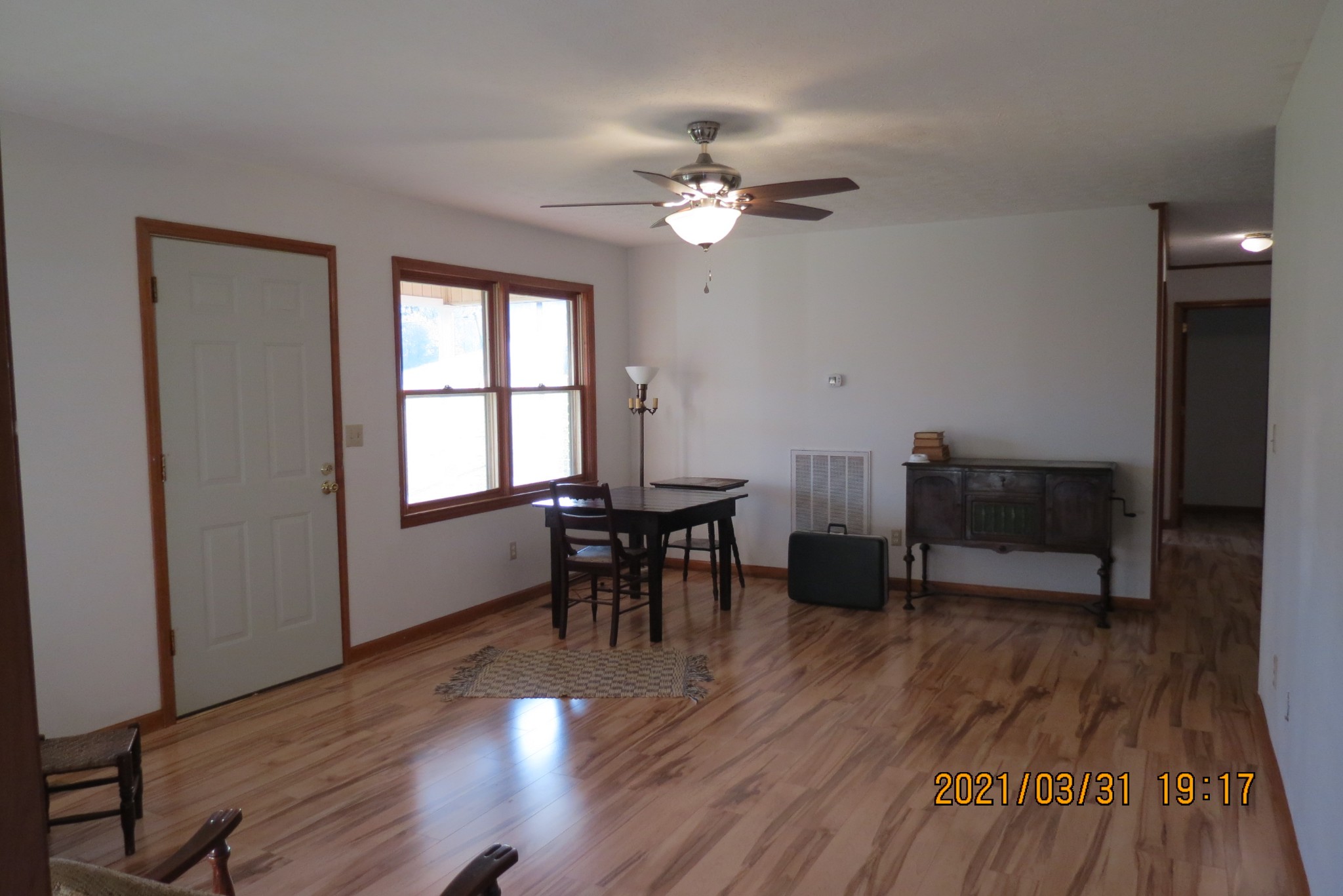 876 Denmark Road Erin, TN 37061 - Photo 24 of 45 a view of a dining room with furniture and wooden floor