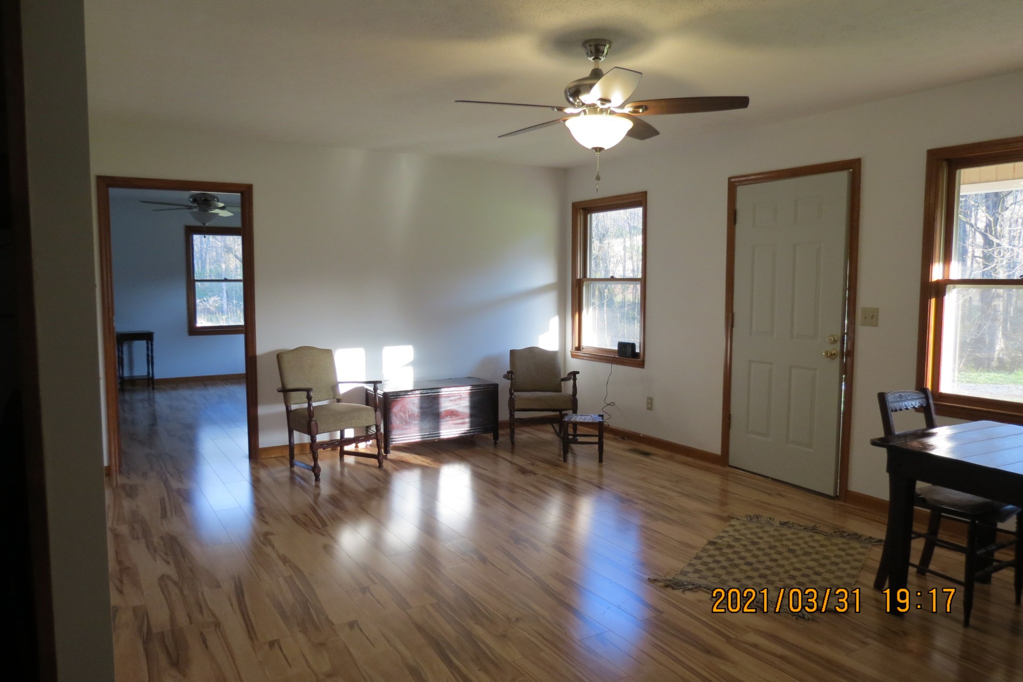 876 Denmark Road Erin, TN 37061 - Photo 25 of 45 a view of a livingroom with furniture and a chandelier