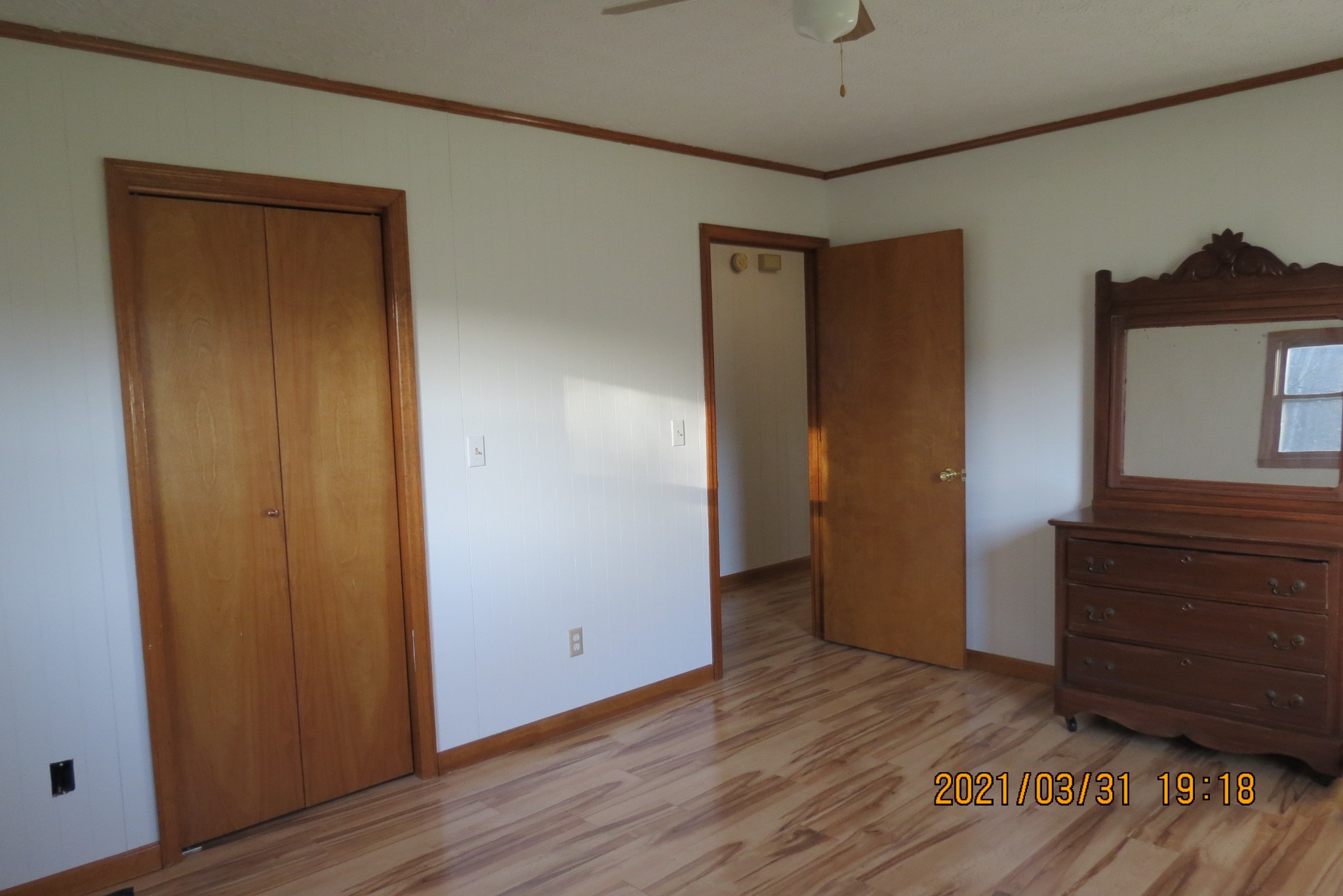876 Denmark Road Erin, TN 37061 - Photo 26 of 45 a view of a hallway to room with wooden floor