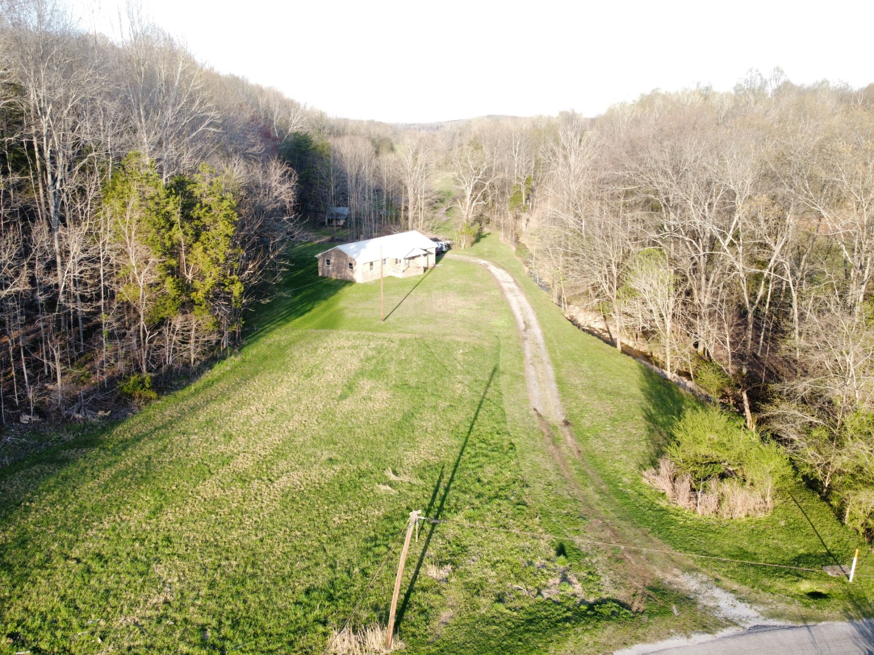 876 Denmark Road Erin, TN 37061 - Photo 45 of 45 a view of a yard with an outdoor space