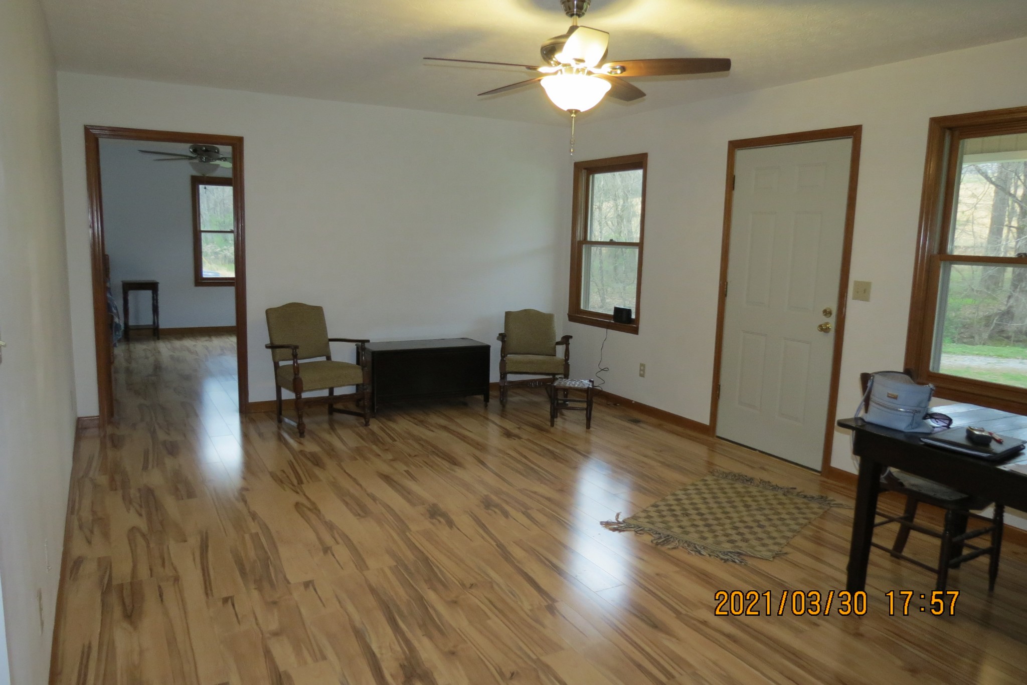 876 Denmark Road Erin, TN 37061 - Photo 10 of 45 a view of a livingroom with furniture and wooden floor