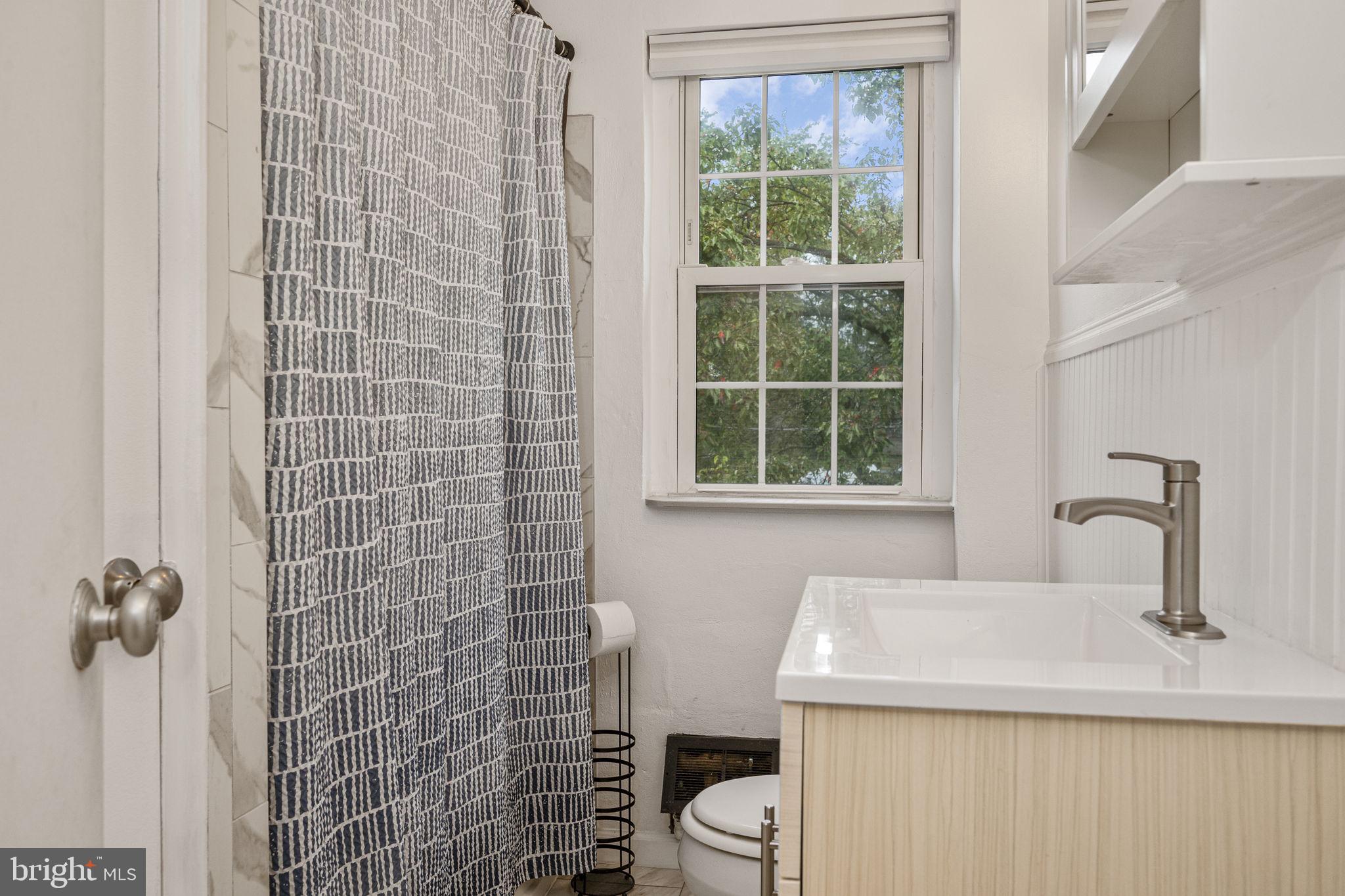 200 Maplewood Drive, Unit D8 Pottstown, PA 19464 - Photo 10 of 12 a bathroom with a sink toilet and shower