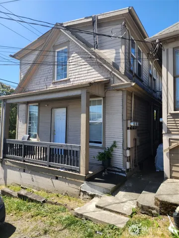 a house with yard in front of it