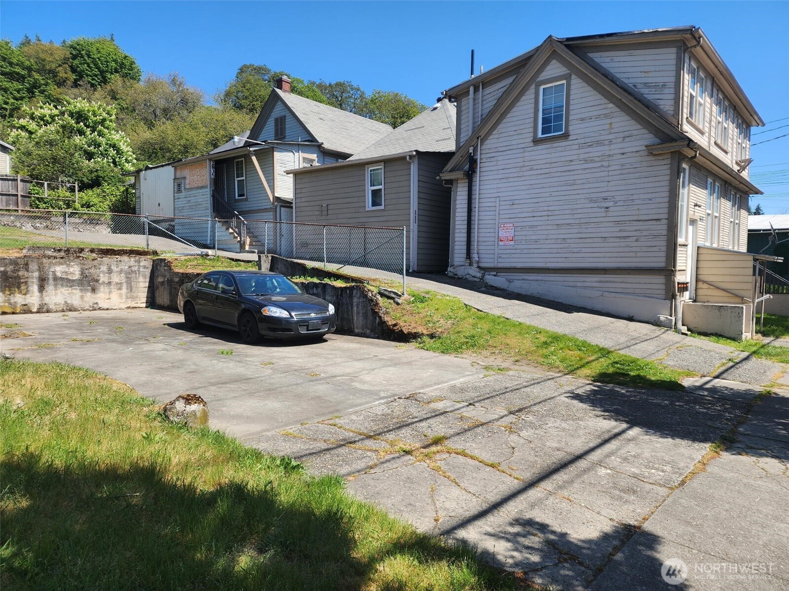1637 Center Street Tacoma, WA 98409 - Photo 5 of 10 a front view of a house with a yard