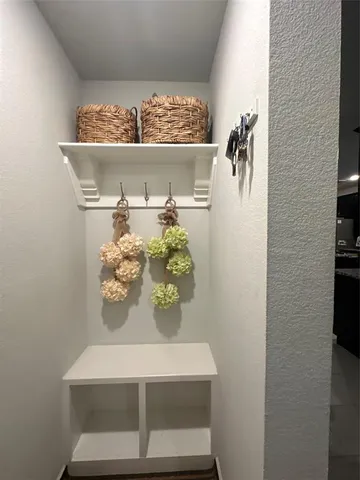 a view of a swimming pool with a lounge chair