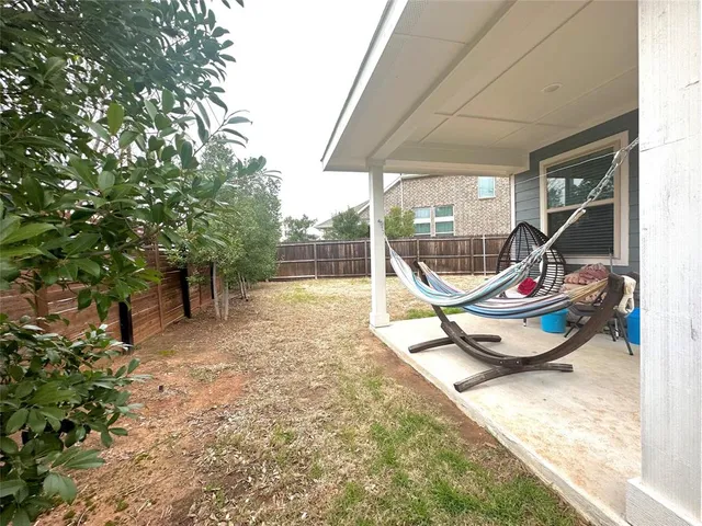 a view of a room with a large window