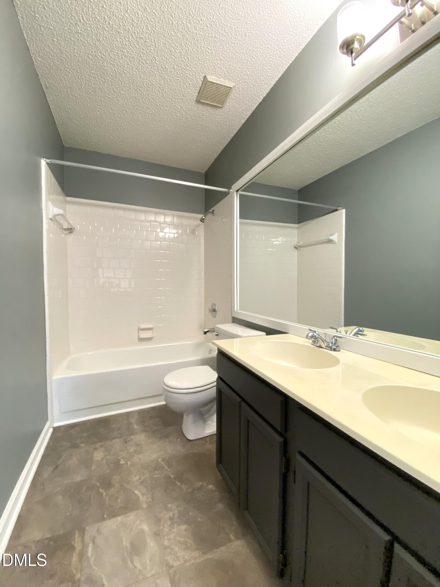 8136 Greywinds Drive Raleigh, NC 27615 - Photo 33 of 49 upstairs bathroom