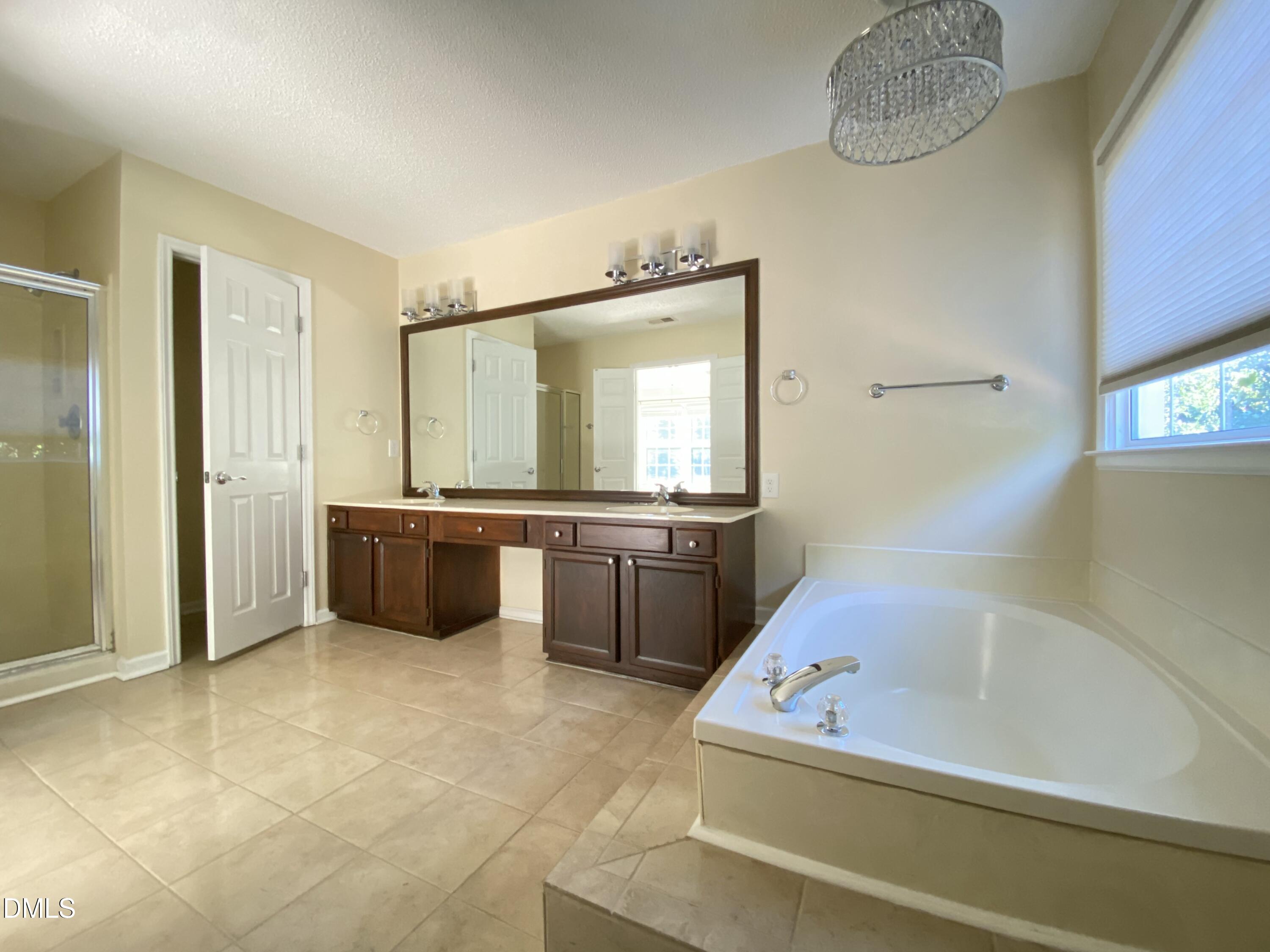 8136 Greywinds Drive Raleigh, NC 27615 - Photo 39 of 49 master bath