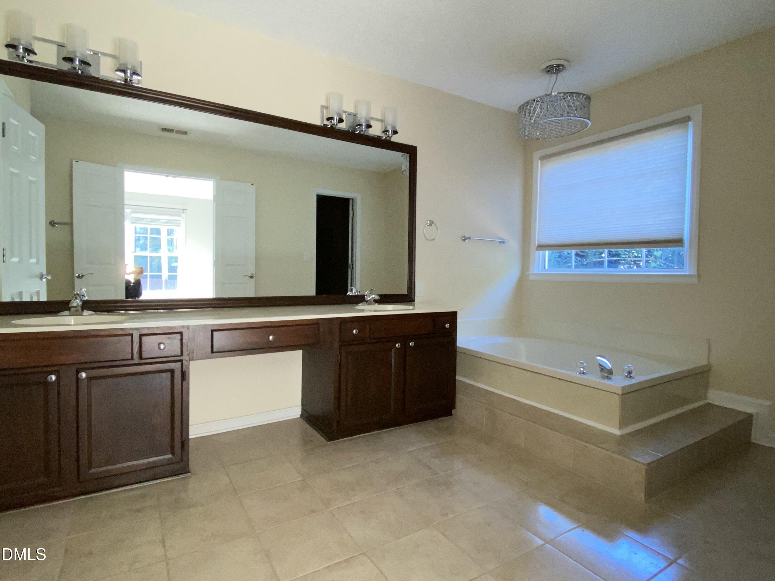 8136 Greywinds Drive Raleigh, NC 27615 - Photo 40 of 49 master bath