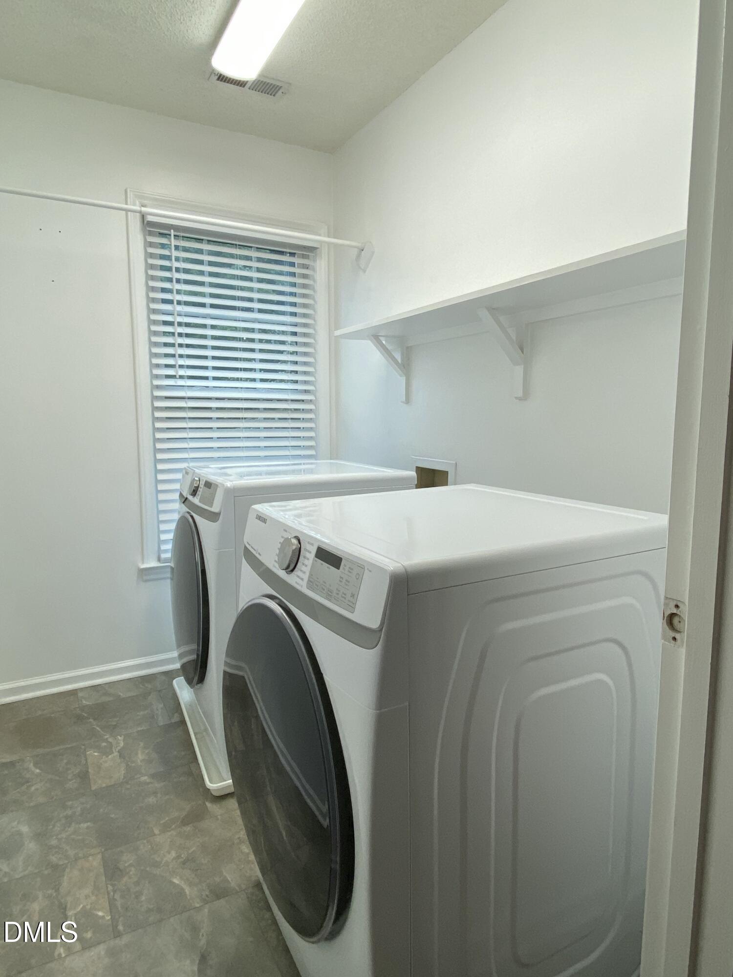 8136 Greywinds Drive Raleigh, NC 27615 - Photo 44 of 49 laundry
