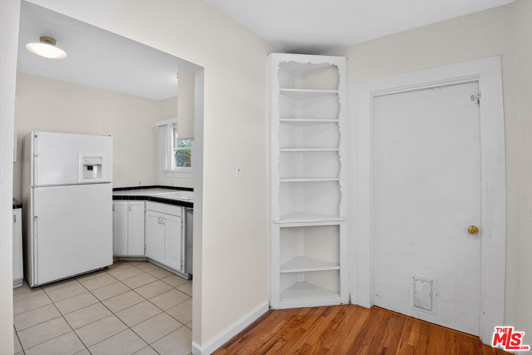 11029 Sarah Street Los Angeles, CA 91602 - Photo 13 of 27 a view of a room with storage and utility